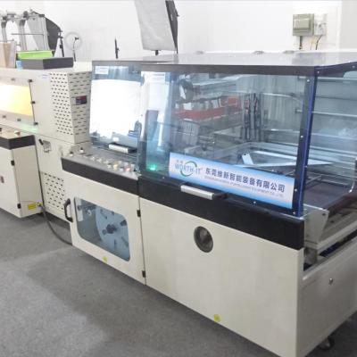 China Automatic Food Shrink Wrap Machine Heat Seal Seal And Shrink Wrapping Machine Supplier for sale