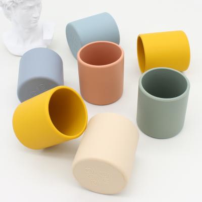 China 2021 New Design BPA Silicone Colorful Baby Silicona Antibacterial Free Wholesale Waterproof Training Cup Small Drinking Cup for sale