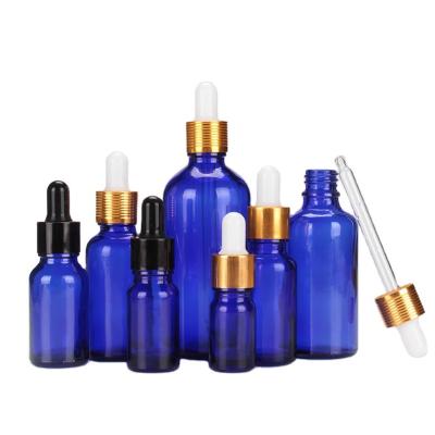 China Fancy 20ml 30ml 50ml Amber Blue Green Essential Oil Luxury Glass Cosmetic Packaging Bottle With Dropper for sale