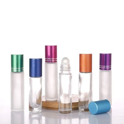 China Luxury Cosmetic Packaging Empty Essential Oil Perfume Glass Roll On Bottle 5ml 10ml With Trackball for sale