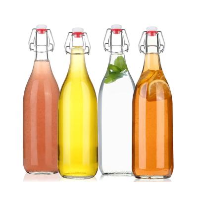 China 500ml 750ml Beverage Drink Water Kombucha Glass Bottle With Swing Top For Airtight Lids for sale