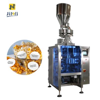 China Pillow Style JINYI JY320K Cutting Back Sealing Multihead Weighing Packing Machine Vertical Granule Packing Machine Chips Packaging Machine for sale