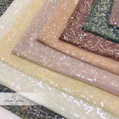 China Viable the latest fashion 100% polyester peach beaded lace fabric for wedding dress for sale