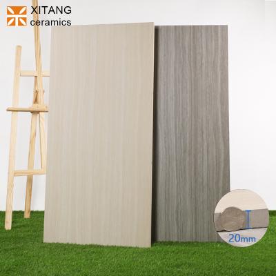 China Modern yellow gray wood design 20cm indoor and outdoor 600 x1200mm thick wall hotel hospital school yard villa France floor tile for sale