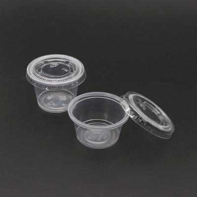 China 1.5 Oz Disposable Clear Food Sauce Cups With Attached Lid for sale