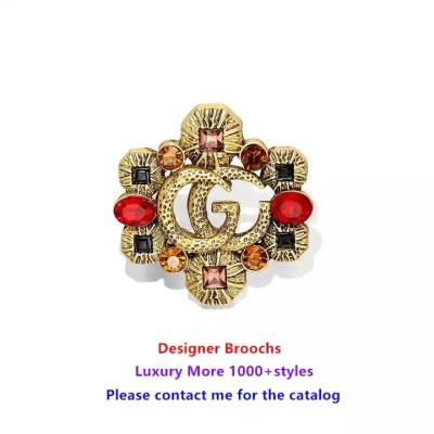 China Brand logo 2023 fashion fine cc designer custom jewelry brooches and pins metal luxury brand logo women for sale