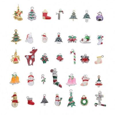 China Multiple styles Christmas Hot Selling Variety Of Dripping Alloy Christmas Tree New Year Necklace Bracelet Pendant DIY Accessories Jewelry for sale