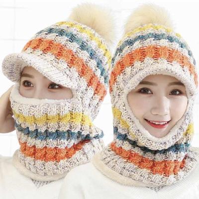 China All-match Winter warm knitted ear protection cap cycling set neck cold cap with eaves fur ball plus velvet padded women's hat for sale