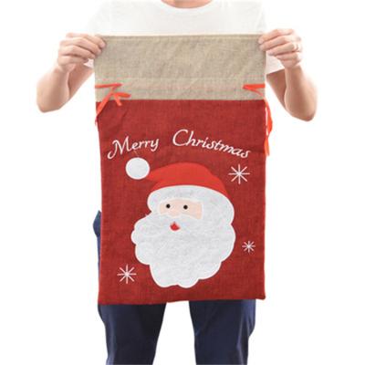 China Promotional Eco-friendly Jute Santa Claus Christmas Drawstring Gift Bag Large Size Eco-Friendly Hot Selling en venta