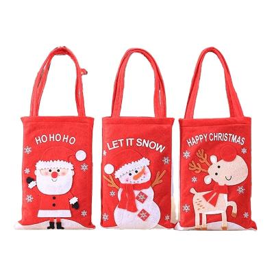 China 2021 Fashion Style Christmas Eco-friendly Snowman Printing Cartoon Children's Gift Small Candy Cotton Portable Canvas Tote Bag zu verkaufen