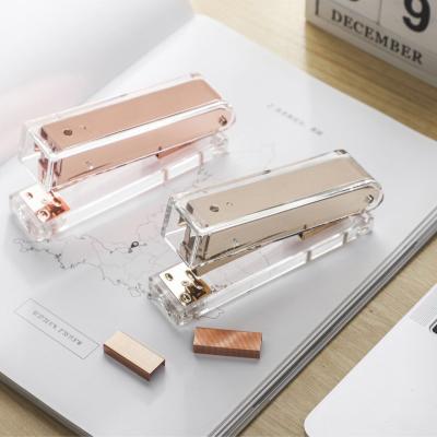 China 2021 Amazon Rose Gold Gift High Grade Acrylic Stapler Hot Selling Stationery Transparent Fashionable Plastic Stapler for sale