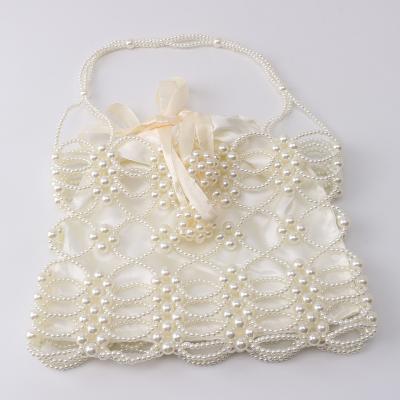 China High Quality Summer Wholesale DIY Mini Fashion Weave Pearl Tote Handbag White Pearl Chain Lady Bag for sale