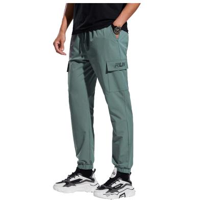 China Wholesale fashion QUICK DRY empty lane pants casual men gym sweatpants streetwear cargo pants elastic pants with side pockets for sale