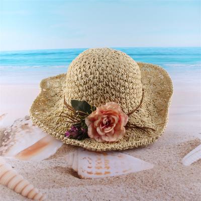 China Garland Straw Hat Beach Sun Fisherman Flower Hat For Women Outdoor Hand Made Woven Striped Foldable Wide Brim for sale