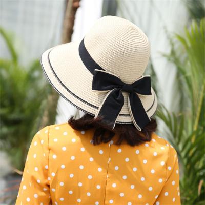 China Stylish Parasol Bow Designer Foldable Straw Hat Eaves Folding Travel Sun Paper Barred Adjustable Waist Hats for sale