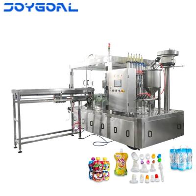 China Food Automatic Rotary Pouch Liquid Filling And Capping Machine Shanghai Spout Factory Price for sale