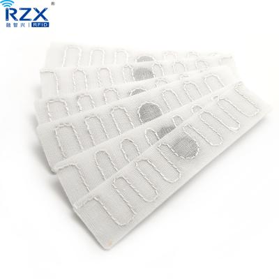 China Variable Data Coding or Printing Hospital Laundry Management Tag Soft Fabric Textile UHF RFID Laundry Tag for sale