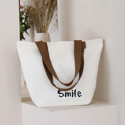 China Other Spot Advertising Students Carry Canvas Bags Wholesale Gifts Color Canvas Shopping Bags Hand Printed Cotton Cloth Bag for sale