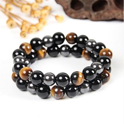 China Vintage Amazon Tiger Eye Black Magnet Bracelet Men And Women Beaded Bracelet Lovers Bracelet for sale