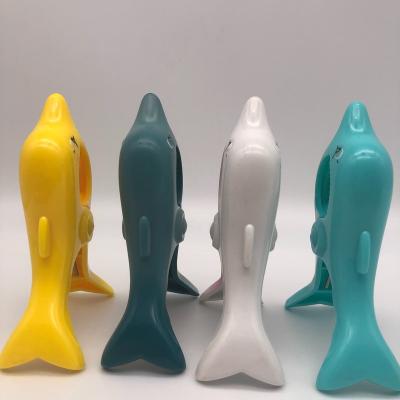 China Toy Plastic Clothes Clip Non-Toxic Cute Animal Noise Dolphin Plastic Napkin Clip Toys Dolphin Pegs China for sale