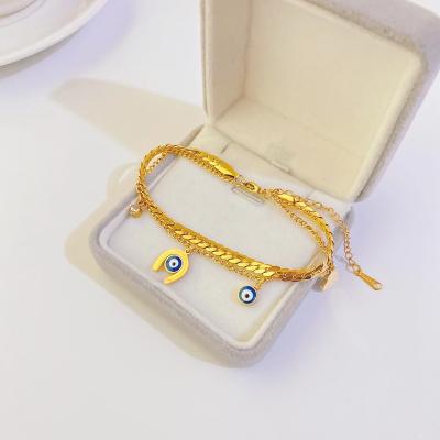 China FASHIONABLE Best Seller 18K Gold Plated Evil Eyes Zircon Stainless Steel Charms Women Heart Shaped Pendant Bracelet for sale