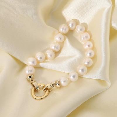 China Fashion Round Buckle 14K Gold Stainless Steel Pearl Ladies Hot Selling Natural Freshwater Bracelet for sale