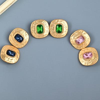 China Vintage Trendy earring Retro handmade stone gold-plated French three-dimensional relief earrings for sale