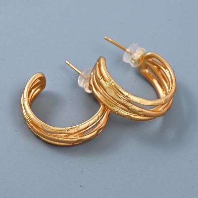 China Environmental Friendly New niche design with crossed gold plated earrings stainless steel earrings for women for sale