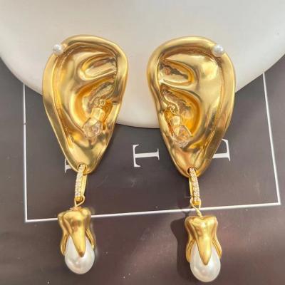 China Environmental Friendly Personalized and trendy facial features ears teeth earrings stainless steel earrings dangling for sale