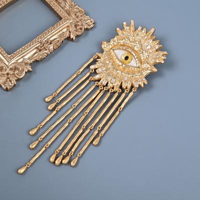 China Fashionable Elegant Diamond Demon Eye Brooches Rhinestone Evil Eyes Brooch Pin For Women Men for sale