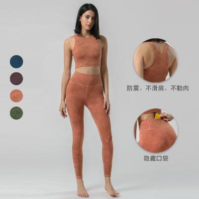 China 2021 new high waisted suit yoga sports beauty back leisure outdoor suit breathable female naked fitness suit for sale