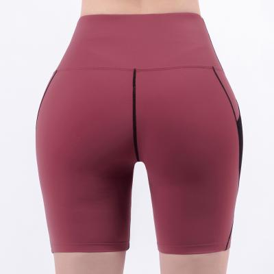 China Breathable Quick-Drying High Waist Naked Pants Women's Yoga Tight Shorts Belly Stretch Five-point Summer Running Sports Pants for sale