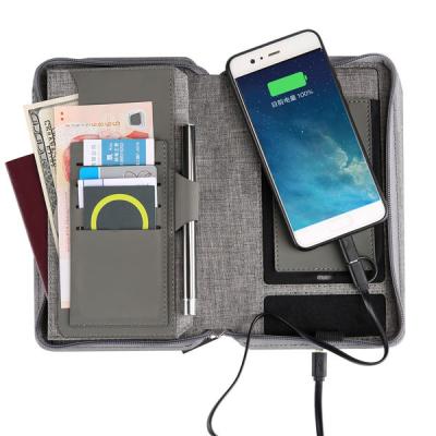 China Portable PU RFID leather powerbank travel wallet multi-function passport holder wallet with powerbank for sale