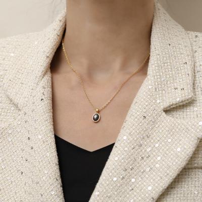 China Wholesale minimalist black geometric oval pendant necklace trendy thin link chain leyered necklaces for women tasty minimalist black geometric oval pendant necklace for sale