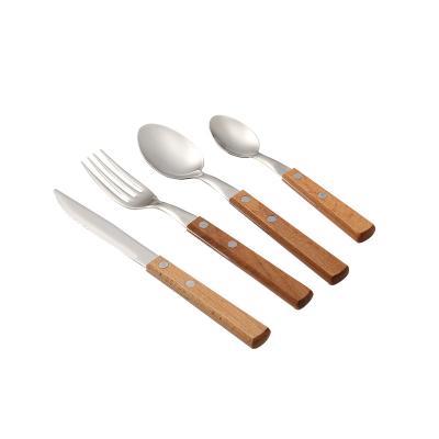 China Sustainable Red Wood Handle Modern Stainless Steel Tableware Knife Fork Spoon Set Four Pieces for sale