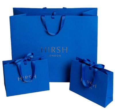 China Custom Luxury Clothing Retail Pink Gift Bag bolsas de papel Shopping Packaging Paper Bags with your own logo For Clothes for sale