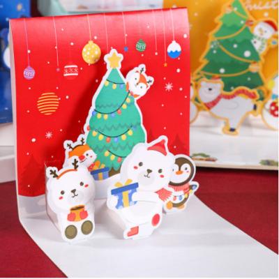 China Wholesale Gifts Creative 3D Christmas Tree Logo Paper Pop Up Greeting Card Gift Card Stereoscopic Carving Merry Christmas Card for sale