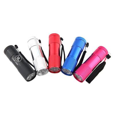 China Emergency OEM Laser Engraved LOGO Promotional Gift Aluminum Alloy Mini Cylinder 9 LED Flashlight With Key Indicator for sale