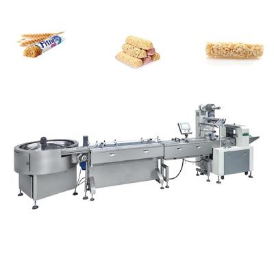 China TEFUDE Food Customized Chinese Pillow Donut Wrapping Machine, Plastic Film Wrapping Machine, Automatic Wrapping Line with Turntable for sale