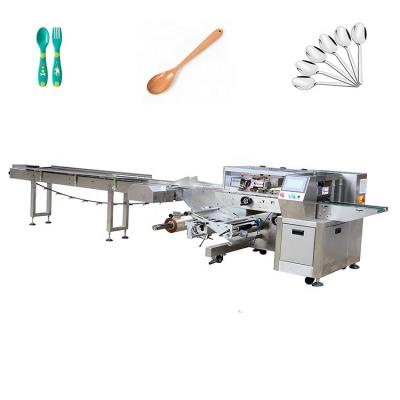 China TEFUDE Food Spot Pack Steel Machine Wrapping Flow Packing Machine Packaging Equipment Machine For Daily Spoon Food Commodity for sale