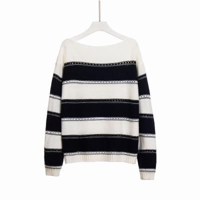 China Breathable Popular Ins Female Sweater Black And White Striped Hollow Knit Sweater for sale