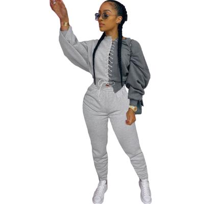 China Breathable Jogger Set Plus Size Bandage Quilting Strappy Crop Sweatshirt Pants 2 Piece Set Women Joggers Suits Set for sale