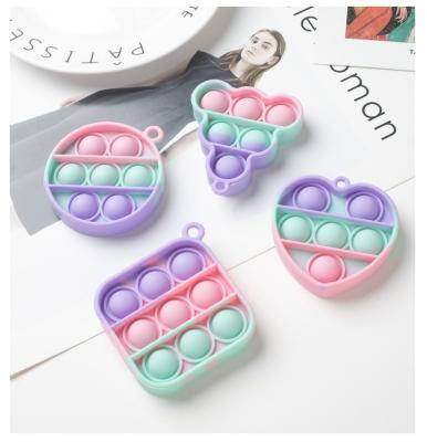 China Mini Silicone Keychain Pop Sensory Simple Interesting Dimple Noise Wiggle Toy Keychain Push Bubble Fidget Trigger Toy Key Chain for sale