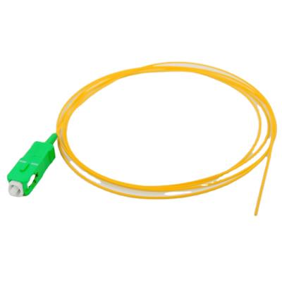 China FTTH CATV Yellow Jacket 0.9mm FTTH 9/125 SM SC APC/PC Simplex Tight Buffer Fiber Optic Pigtail for sale