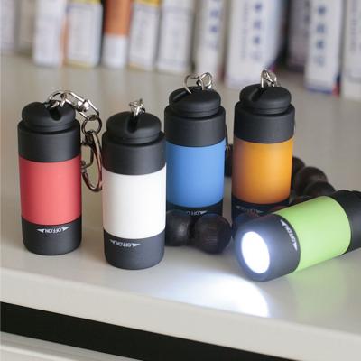 China Emergency Customized Cute Mini Torch Light USB Rechargeable Colorful Led Chain Head Flashlight for sale