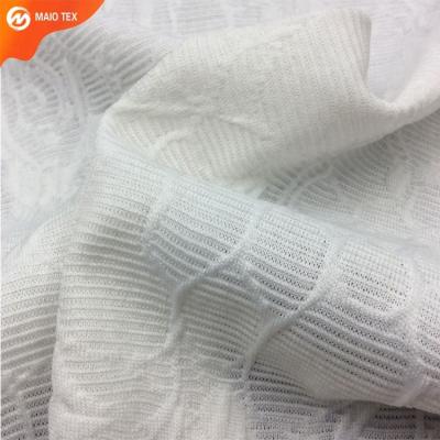 China Anti Pill Polyester Spandex Jacquard Crepe Seerscuker Ball Knitted Fabric For Bows for sale