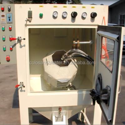 China Critical Cleaning / Residue Free Drum Sandblasting Machine / Two Guns Drum Automatic Sandblasting Machine for sale