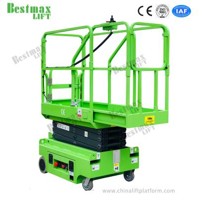 China Swivel Wheels Type 240kg Load Mini Scissor Lift Full Electric High Performance for sale