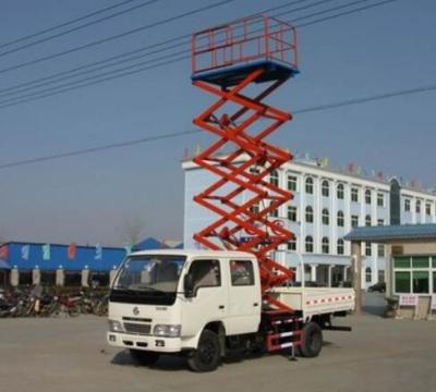 Chine ascenseur des ciseaux 300KG monté par camion télescopique de 14M avec le bras de levage d'acier au manganèse à vendre