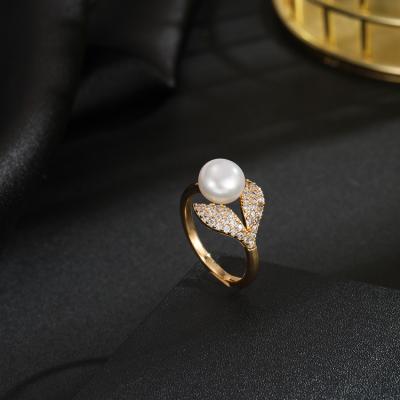 China Simple TRENDY Style 18k Gold Plated Natural Freshwater Pearl Ring Classic Leaf White Grass Diamonds Ladies Rings for sale